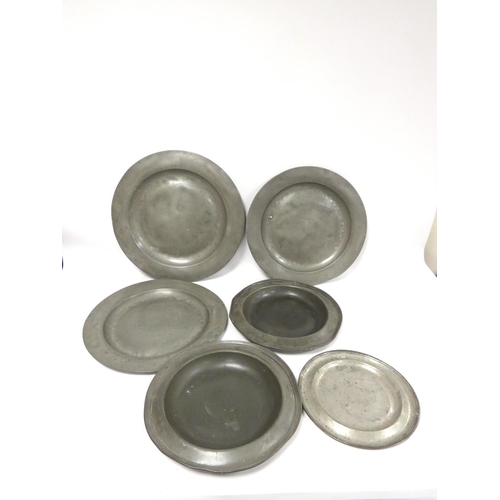 239 - Group of pewter chargers, circa early 19th century, various sizes, Largest 45cm diameter. (5)