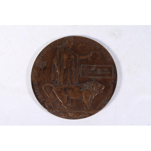 1179 - Medal of Ernest Switzer Ford Dougherty comprising WWI death plaque [ERNEST SWITZER FORD DOUGHERTY], ... 