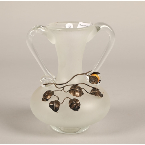 186 - Twin handled glass vase with white metal branch and fruit 