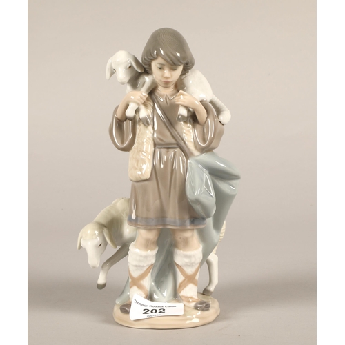 202 - Lladro figurine shepherd boy with lamb and sheep