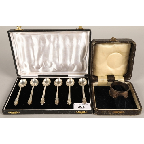 205 - Cased set of six silver coffee spoons with Ganesh figures on ends, and a cased silver napkin ring ha... 