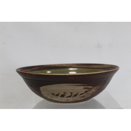 214 - Harry and May Davis Crowan, Cornish studio pottery circular bowl with wax resist, brown and celadon ... 