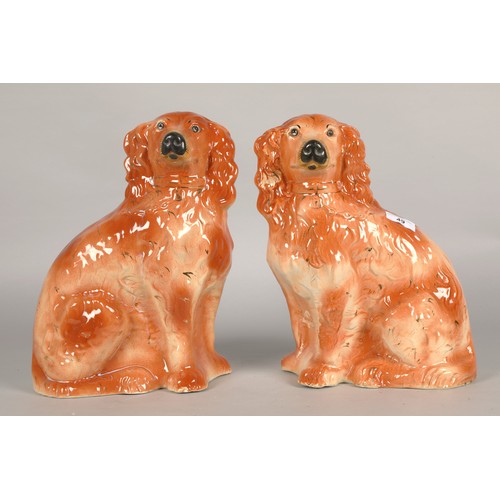 49 - Pair of large brown Staffordshire wally dogs, each 32cm h