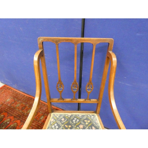 356 - Edwardian inlaid mahogany parlour open armchair, with carved rail back and downswept arm rests. Heig... 