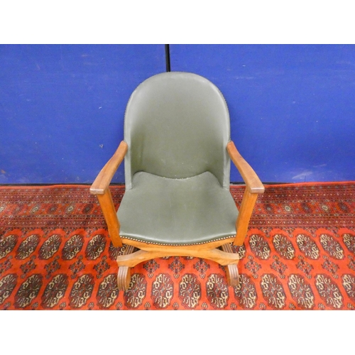 379 - Early 20th century Arts & Crafts oak and leather low seated cross frame tub chair.