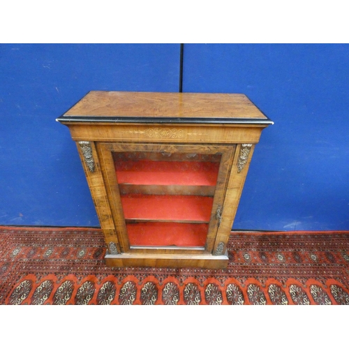 384 - Victorian inlaid walnut pier cabinet with glazed door enclosing shelves.