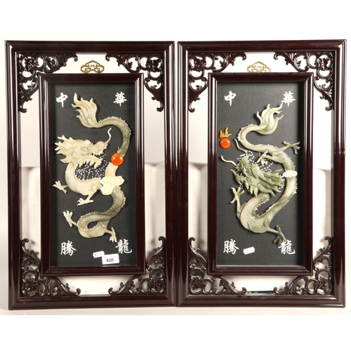 420 - Pair of decorative Chinese style imitation jade dragon wall hangings