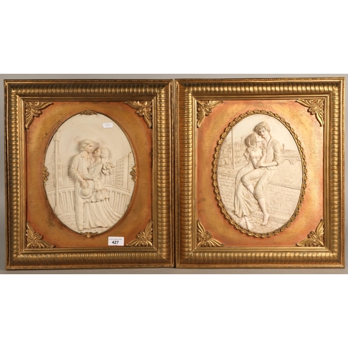 427 - Contemporary pair of decorative wall panels in relief