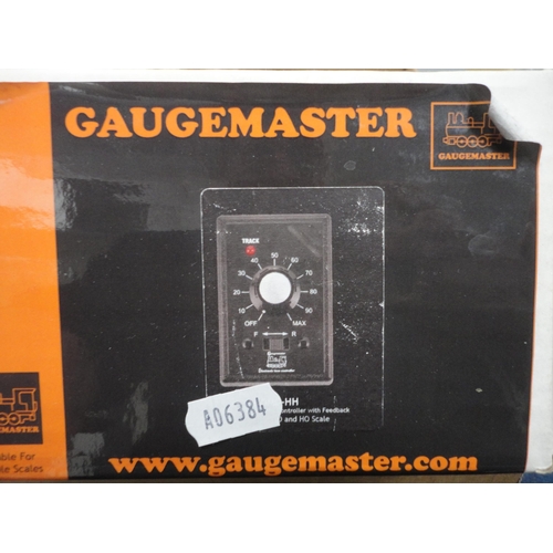 10 - Two cartons containing Gaugemaster model HH walkabout controller, collection of assorted model railw... 