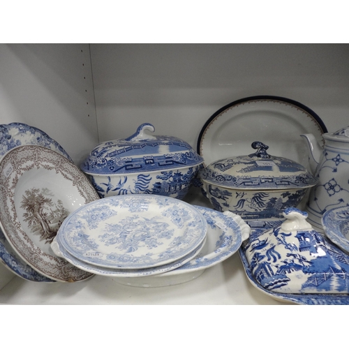 101 - Victorian and later blue and white wares to include tureens etc (one shelf).