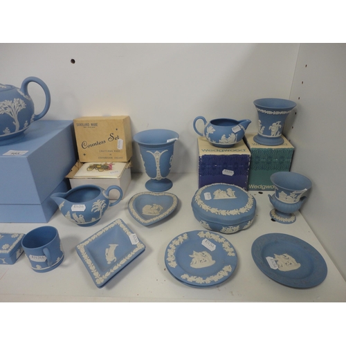 103 - Group of Wedgwood Jasper ware to include pin dishes, vases, teapot, some boxed examples, a Wedgwood ... 