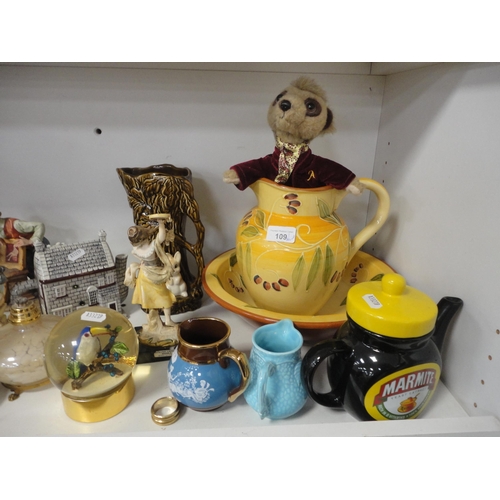 109 - Ornaments, vases, wooden items, ornaments contained in a display case, claret jug, egg ornaments, pl... 