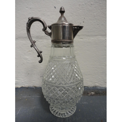 109 - Ornaments, vases, wooden items, ornaments contained in a display case, claret jug, egg ornaments, pl... 