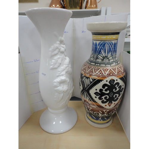 184 - Blue Mountain-style large figure of a lion and a dolphin, also a vase and a jardini&egrave;re stand.... 