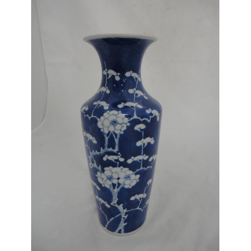 195 - Kangxi-style blue and white prunus decorated vase.