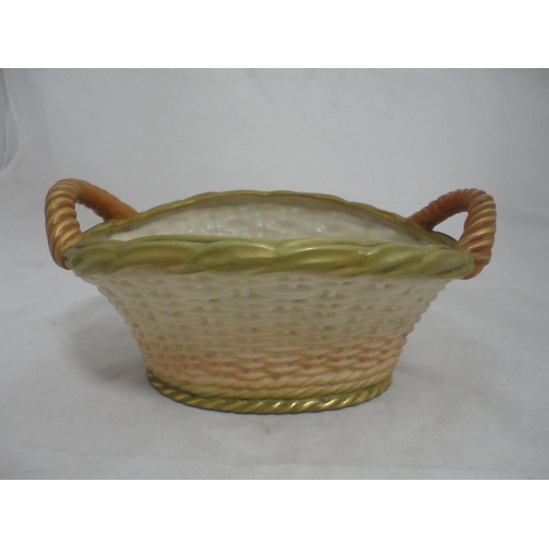 197 - Royal Worcester blush ivory twin-handled basket, c. 1905, with reticulated decoration, shape no. 236... 