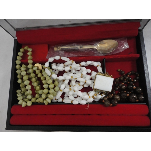 207 - Costume jewellery to include cufflinks, rings, bead necklaces contained in a jewellery box and a dis... 