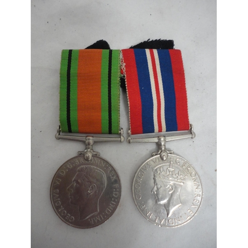 208 - Pair of WWII campaign medals with matching dress miniatures.