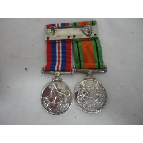 208 - Pair of WWII campaign medals with matching dress miniatures.