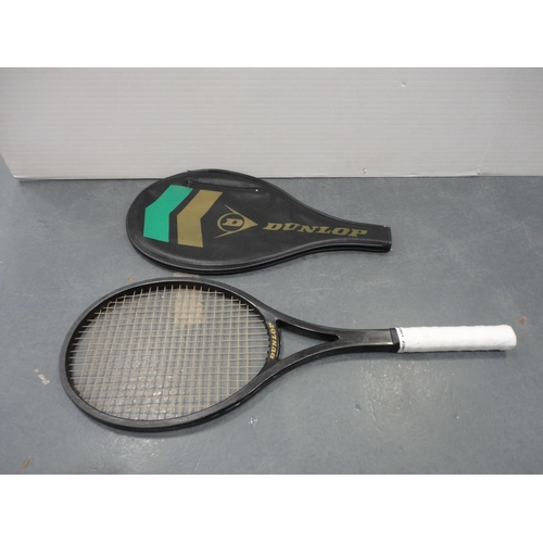 21 - Two cased tennis racquets, black backpack,&nbsp;giant spoon and fork set, travel guides, wicker fram... 