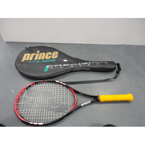 21 - Two cased tennis racquets, black backpack,&nbsp;giant spoon and fork set, travel guides, wicker fram... 