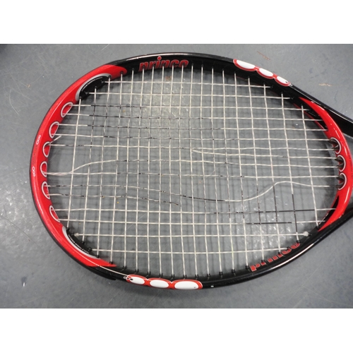 21 - Two cased tennis racquets, black backpack,&nbsp;giant spoon and fork set, travel guides, wicker fram... 