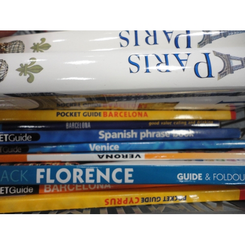 21 - Two cased tennis racquets, black backpack,&nbsp;giant spoon and fork set, travel guides, wicker fram... 
