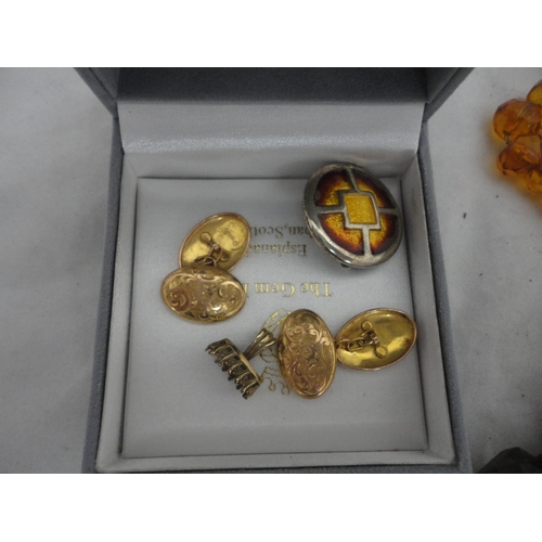 210 - Bag containing glass beads, silver brooch and a white metal Celtic-style brooch etc.
