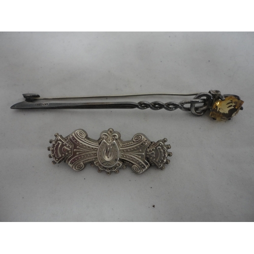 210 - Bag containing glass beads, silver brooch and a white metal Celtic-style brooch etc.
