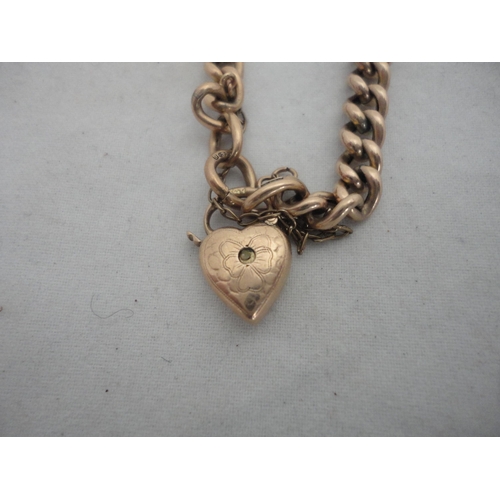 213 - 9ct gold bracelet with heart-shaped locket, 6.1g.