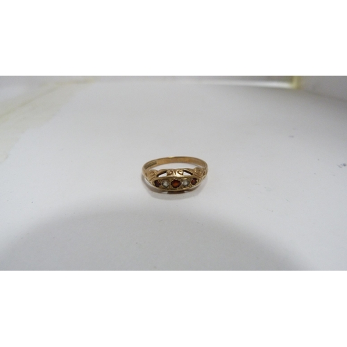 223 - Lady's 9ct gold and ruby-set ring, 1.8g gross.
