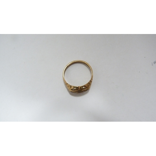 223 - Lady's 9ct gold and ruby-set ring, 1.8g gross.
