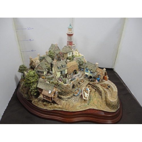 225 - Lilliput Lane limited edition model village, 'Out of the Storm', on plinth stand, with box.