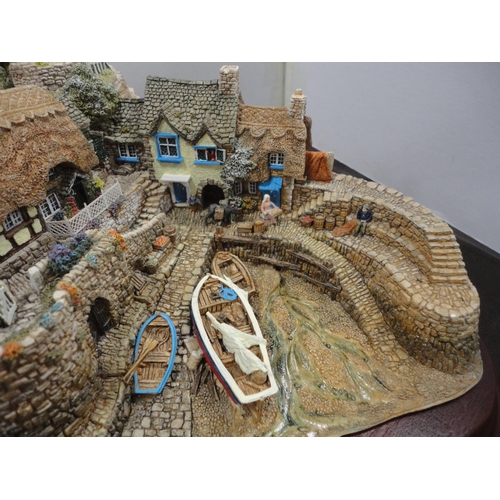225 - Lilliput Lane limited edition model village, 'Out of the Storm', on plinth stand, with box.