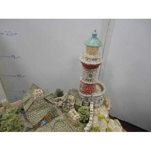 225 - Lilliput Lane limited edition model village, 'Out of the Storm', on plinth stand, with box.