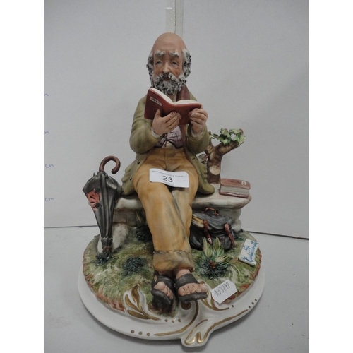 23 - Capodimonte figure group in the form of a man reading on a bench and three other similar figures.  (... 