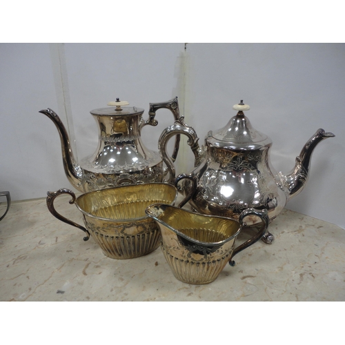 234 - Group of EP and plated wares to include a three-piece tea set, two teapots, casserole etc.