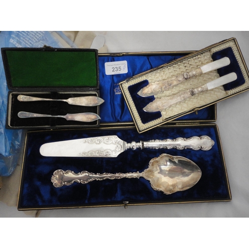 235 - Group of boxed cutlery to include servers, jam spoons and butter knives, and assorted loose table cu... 