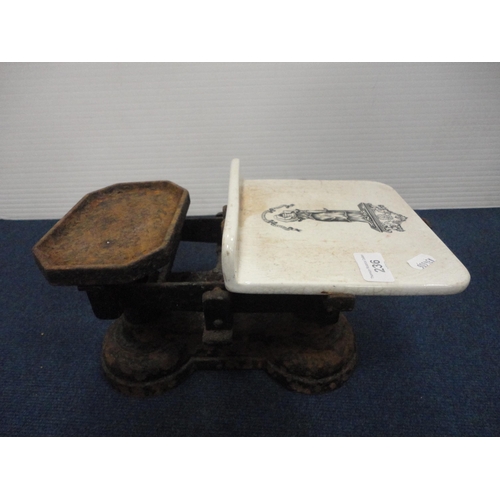 236 - Set of iron scales with iron and brass weights.