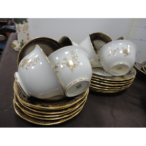 240 - Aynsley cobalt and gilt decorated part tea service.