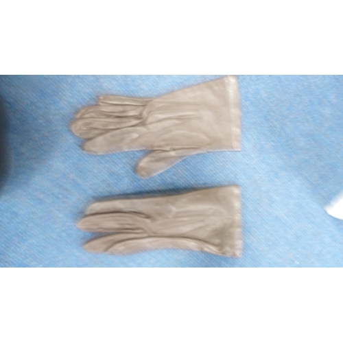 243 - Quantity of scarves, gloves, handkerchiefs etc.