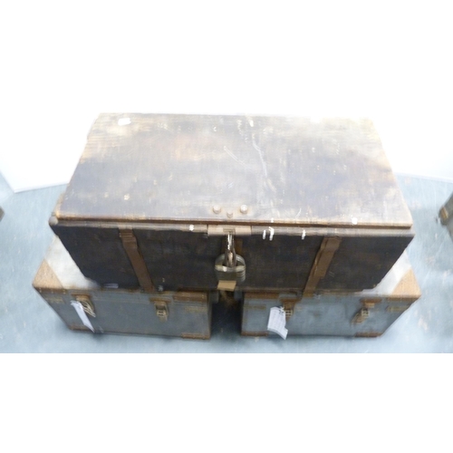 257 - Two military storage boxes and a wooden trunk.  (3)