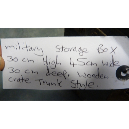 257 - Two military storage boxes and a wooden trunk.  (3)
