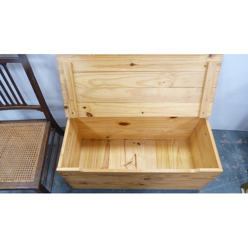 258 - Pine storage chest and a chair with bergère seat.  (2)