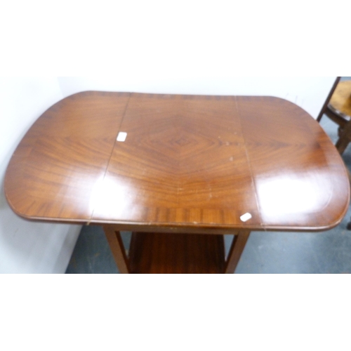 261 - Tea trolley and drum-shaped occasional table with tooled top.