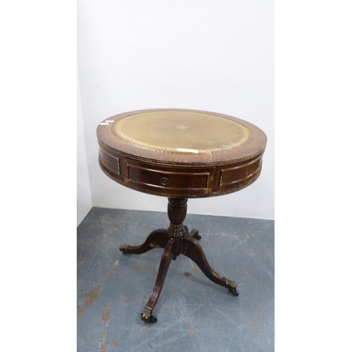 261 - Tea trolley and drum-shaped occasional table with tooled top.