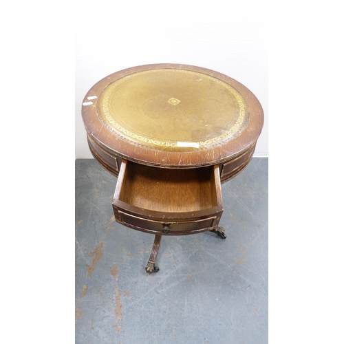 261 - Tea trolley and drum-shaped occasional table with tooled top.