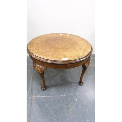 264 - Walnut coffee table and a wicker chair.&nbsp; (2)