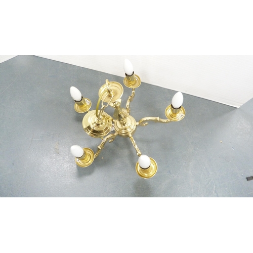 292 - Brass five-branch electrolier and a fire screen.