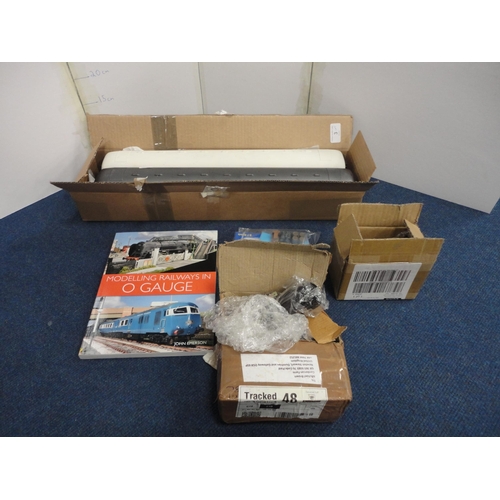 3 - Large Lima of Italy Gril Express coach, another, also model railway accessories and a book.